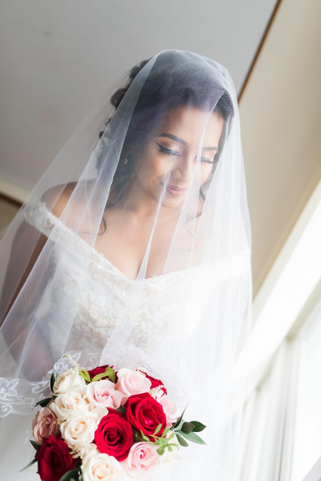 Western bride with veil and bouquet styled by Malini Michelle in Singapore